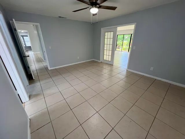 an empty room with windows