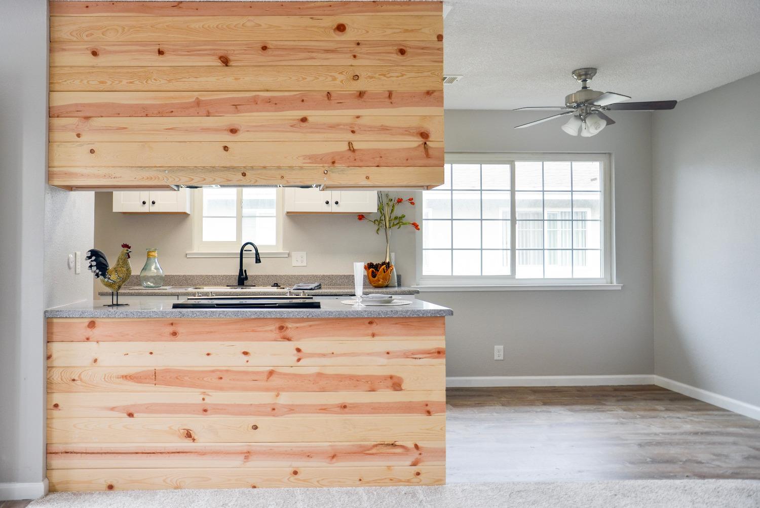 2320 Peach Avenue, Unit 4 Clovis, CA 93612 - Photo 2 of 14 a kitchen with a stove cabinets and a window