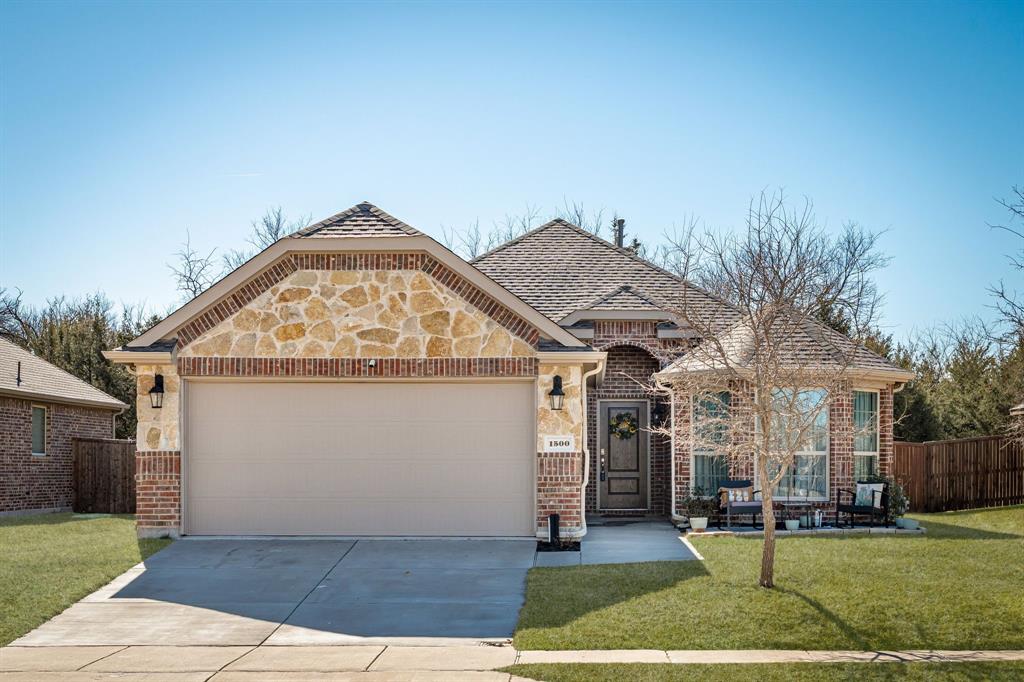 1500 Elizabeth Street Anna, TX 75409 - Photo 3 of 25 a front view of a house with garden