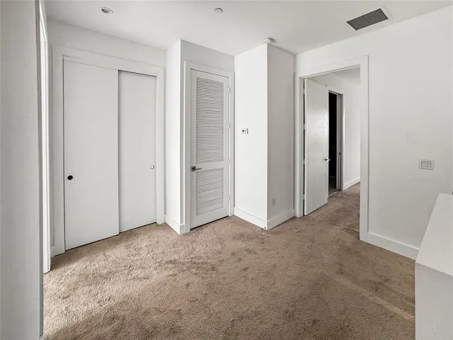 an empty room with closet