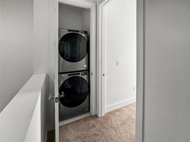 a front view of a building with parking space