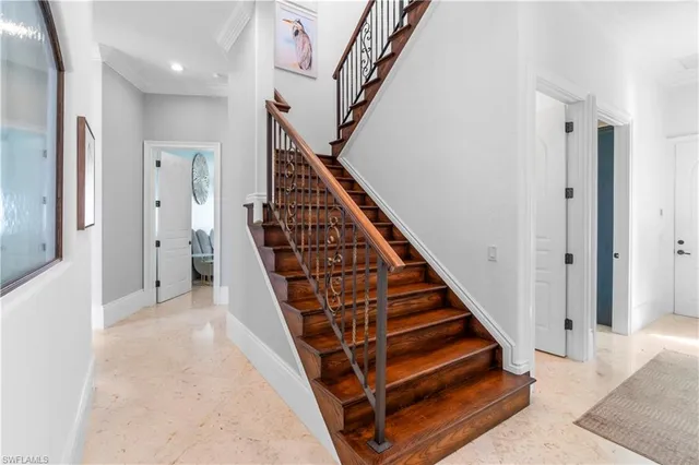 a view of a hallway with staircase
