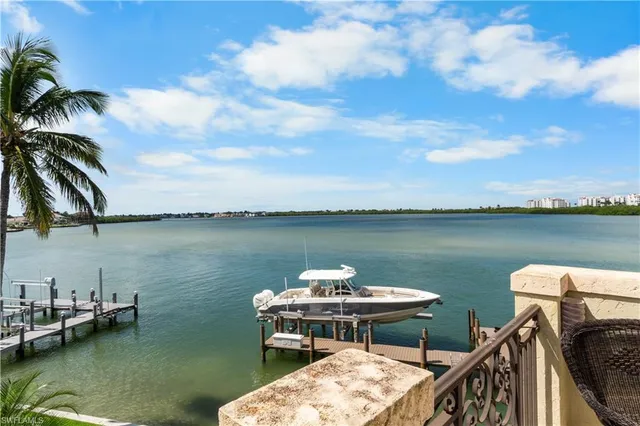 a view of a lake with a deck