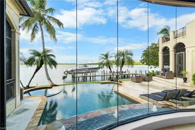 a view of a swimming pool with a chair