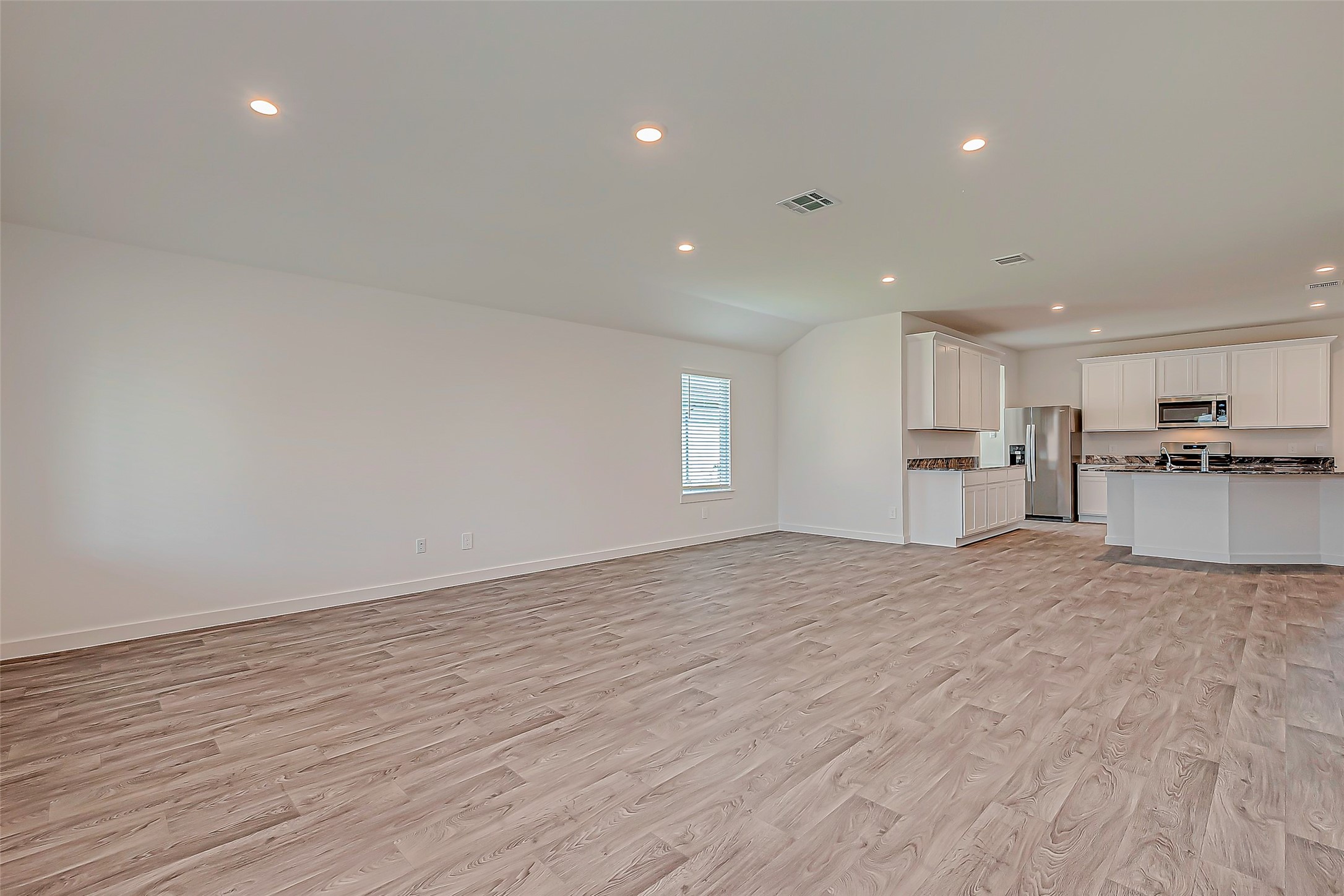 6108 Ryon Falls Drive Rosenberg, TX 77469 - Photo 11 of 39 a view of empty room with wooden floor