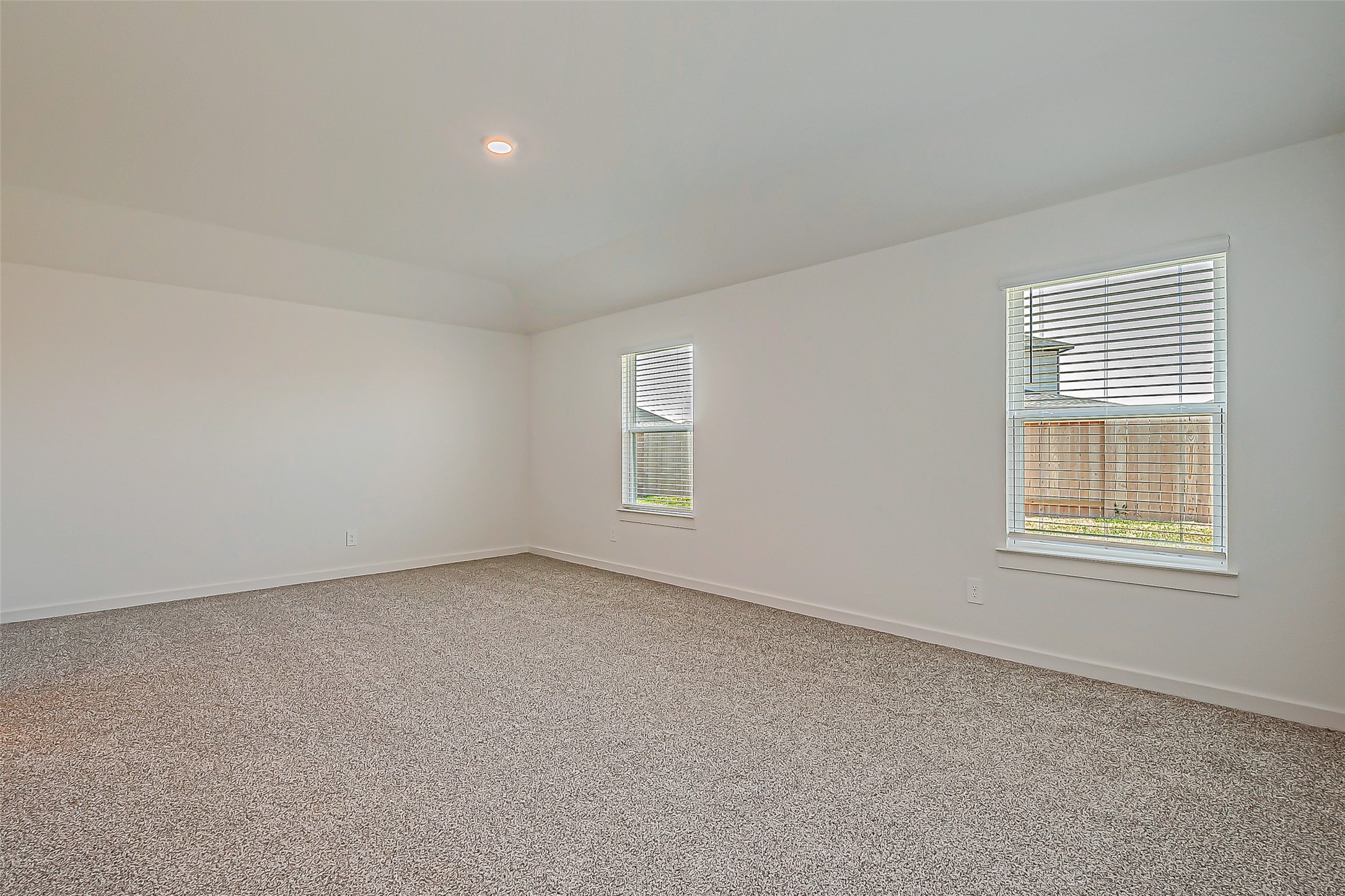 6108 Ryon Falls Drive Rosenberg, TX 77469 - Photo 24 of 39 an empty room with windows
