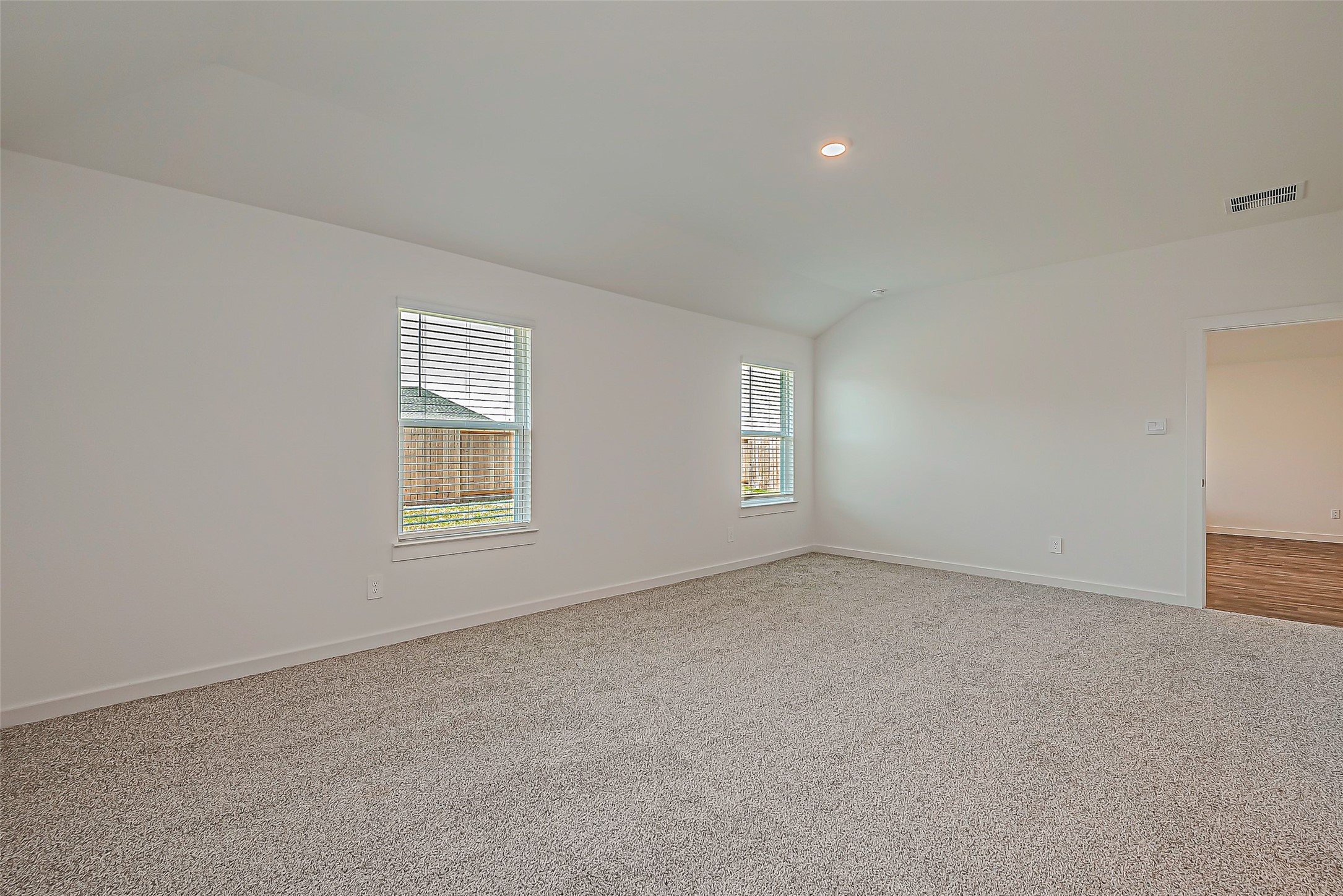 6108 Ryon Falls Drive Rosenberg, TX 77469 - Photo 25 of 39 an empty room with windows