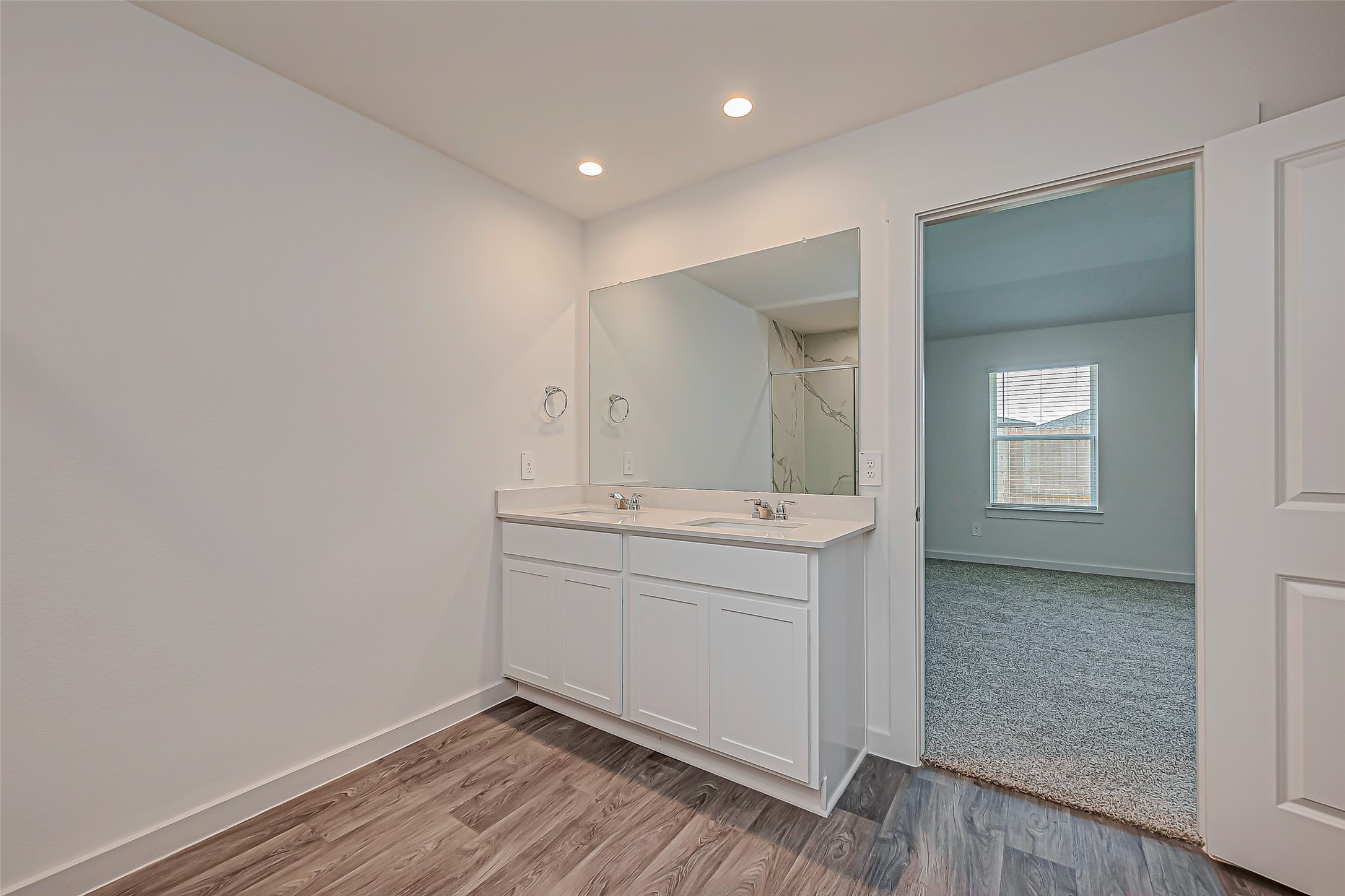 6108 Ryon Falls Drive Rosenberg, TX 77469 - Photo 28 of 39 a room with a sink cabinets and wooden floor