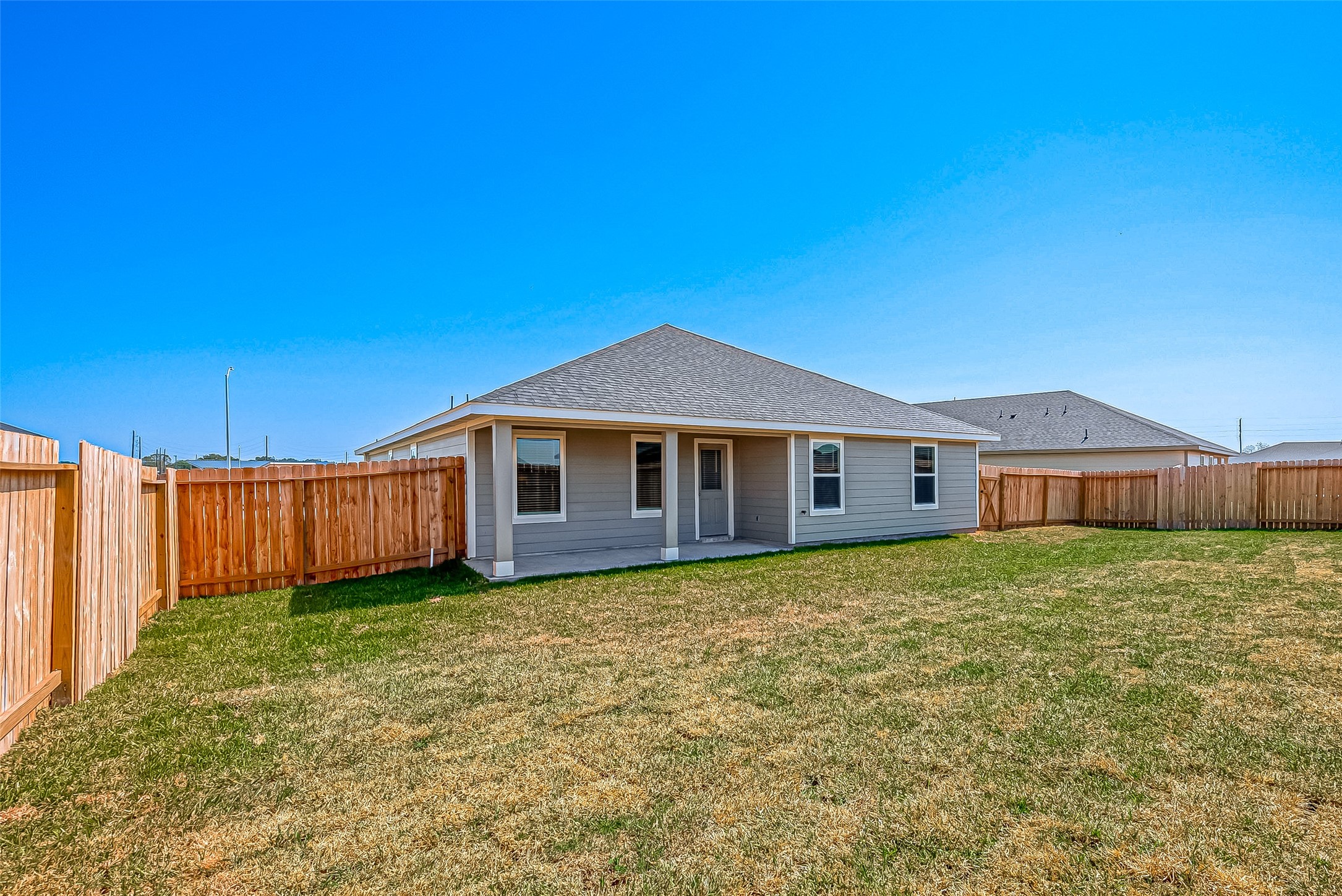 6108 Ryon Falls Drive Rosenberg, TX 77469 - Photo 39 of 39 a big house with a big yard and large trees