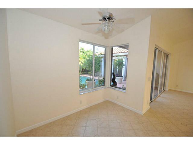 6293 Northwest 23rd Road Boca Raton, FL 33434 - Photo 8 of 25 a view of an empty room with a window