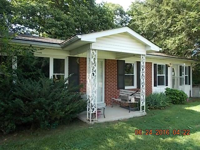 522 Bennett Hill Road Red Boiling Springs, TN 37150 - Photo 3 of 23 front view of a house with a yard