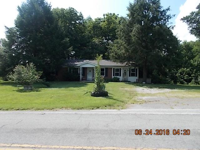 522 Bennett Hill Road Red Boiling Springs, TN 37150 - Photo 4 of 23 a front view of house with a garden