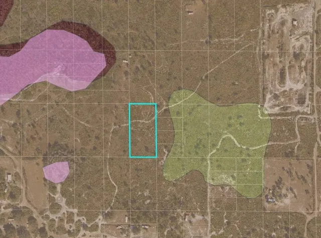 a bathroom with a pink shower