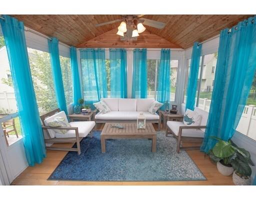 6 North Martin Road Amesbury, MA 01913 - Photo 12 of 29 a living room with furniture and a large window