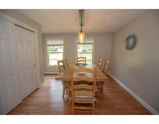 6 North Martin Road Amesbury, MA 01913 - Photo 14 of 29 a view of a dining room with furniture window and wooden floor