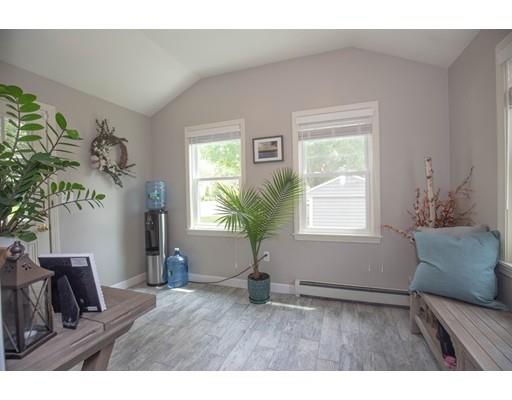 6 North Martin Road Amesbury, MA 01913 - Photo 15 of 29 a living room with furniture and a potted plant