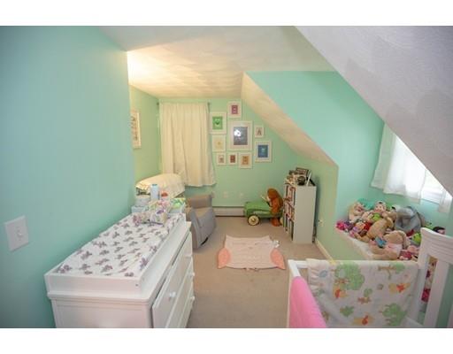 6 North Martin Road Amesbury, MA 01913 - Photo 19 of 29 a bedroom with a bed and a dresser