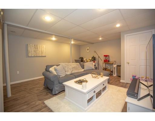 6 North Martin Road Amesbury, MA 01913 - Photo 24 of 29 a living room with furniture and a wooden floor