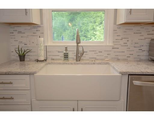 6 North Martin Road Amesbury, MA 01913 - Photo 7 of 29 a bathroom with a granite countertop sink and window