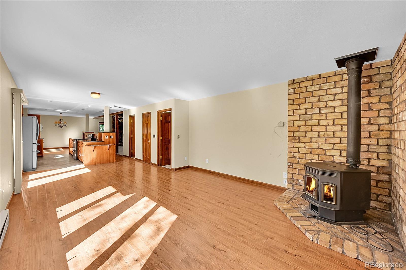 348 Nova Road Pine, CO 80470 - Photo 14 of 50 a view of a living room with furniture and a flat screen tv
