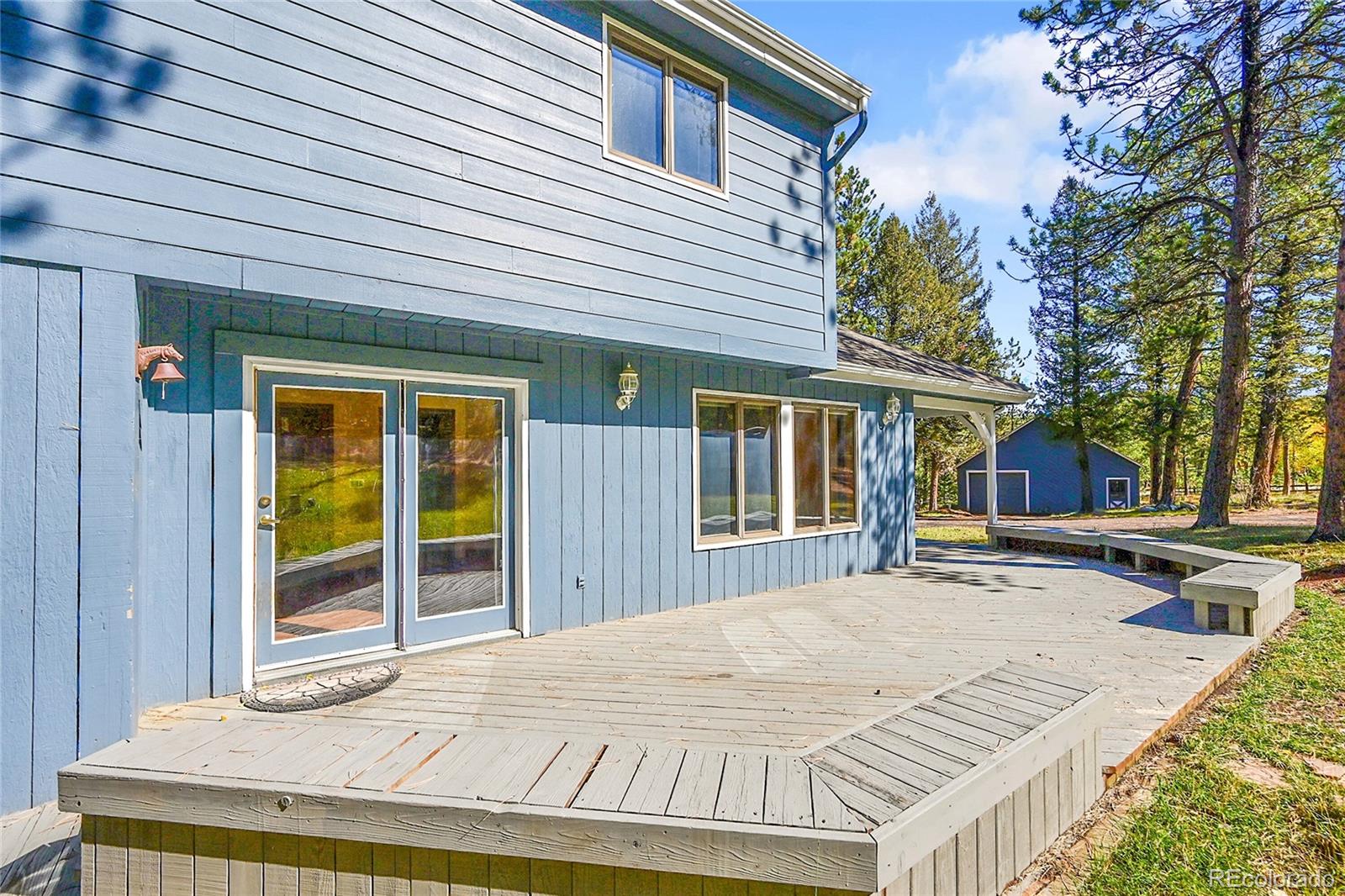348 Nova Road Pine, CO 80470 - Photo 34 of 50 a house view with a backyard space