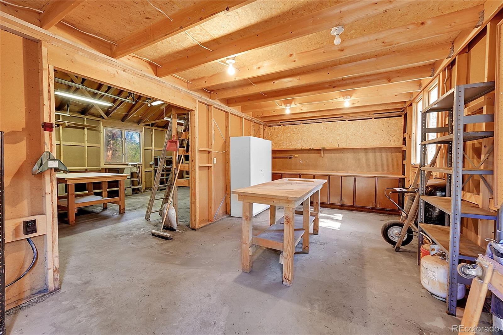 348 Nova Road Pine, CO 80470 - Photo 37 of 50 a view of a room with gym equipment