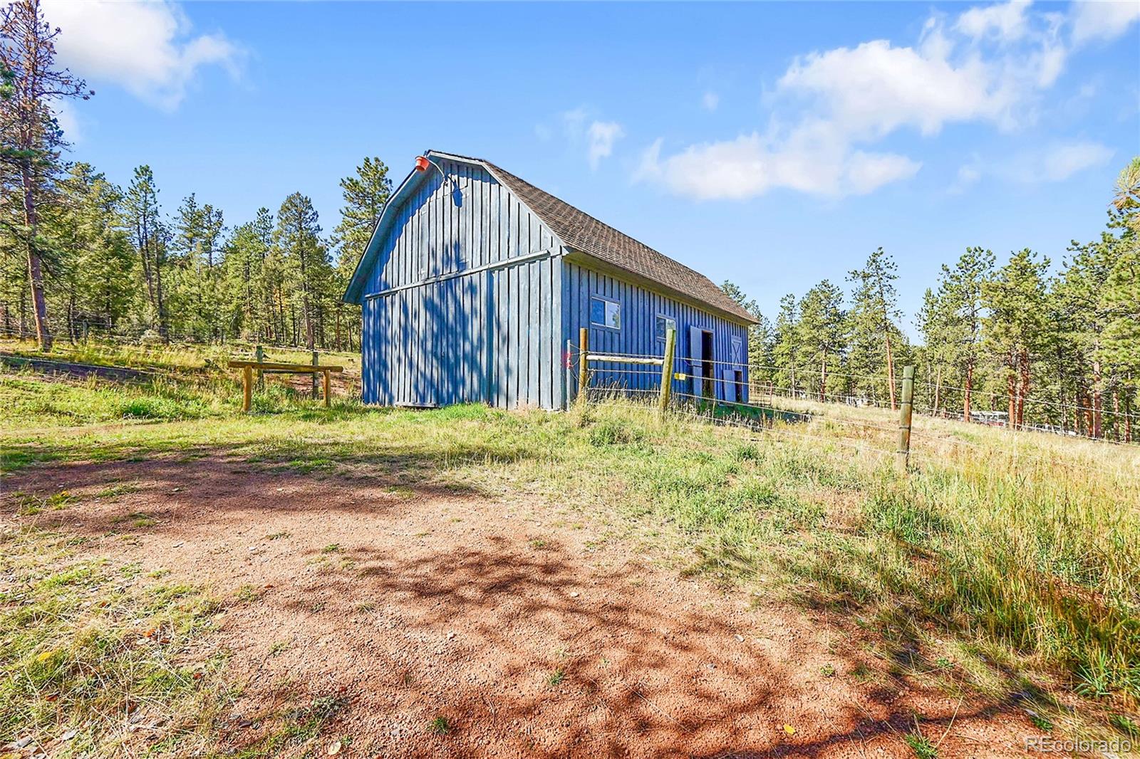 348 Nova Road Pine, CO 80470 - Photo 40 of 50 a view of backyard with green space