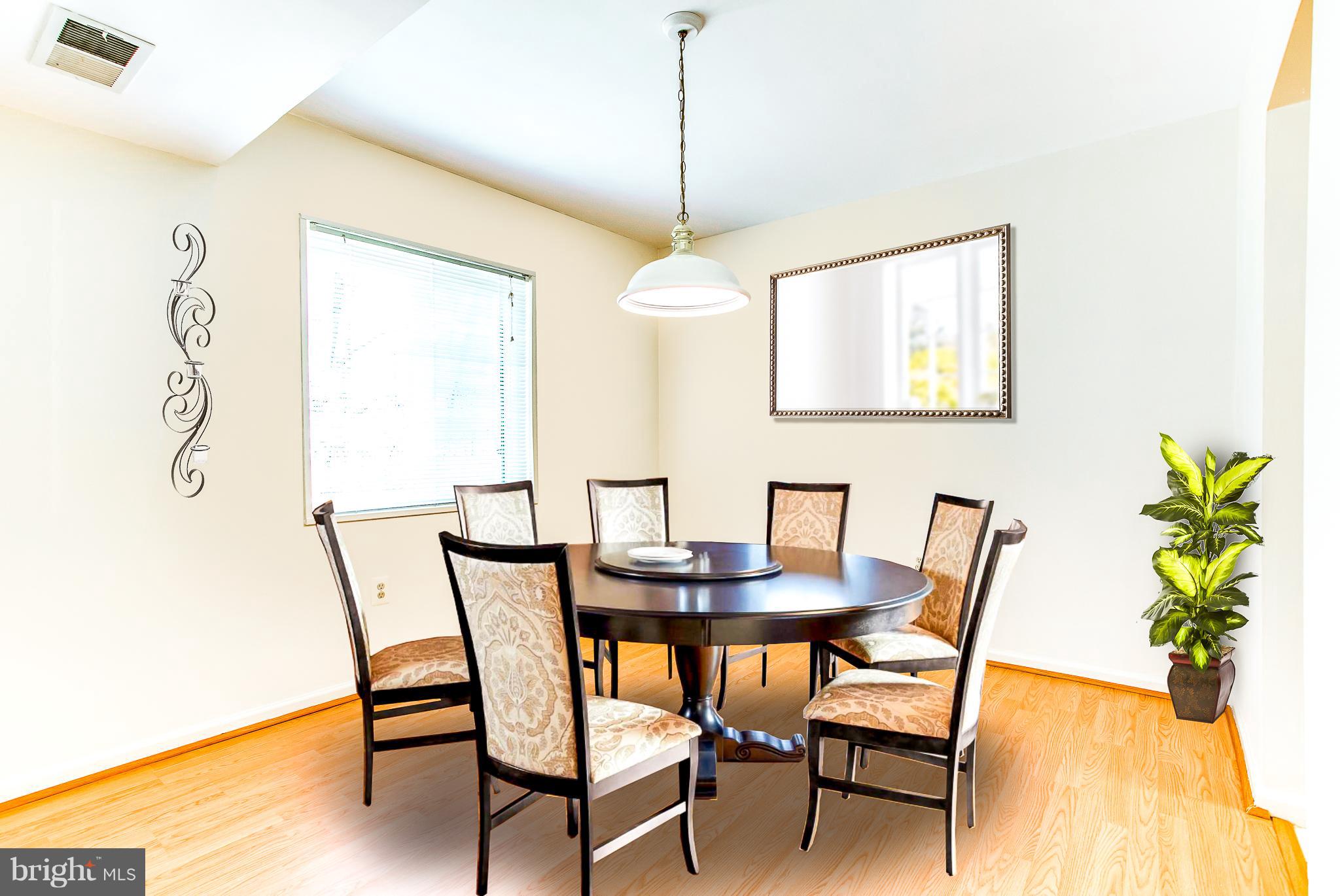 1523 Northgate Square, Unit 1B Reston, VA 20190 - Photo 10 of 30 Virtually Staged Dining Room