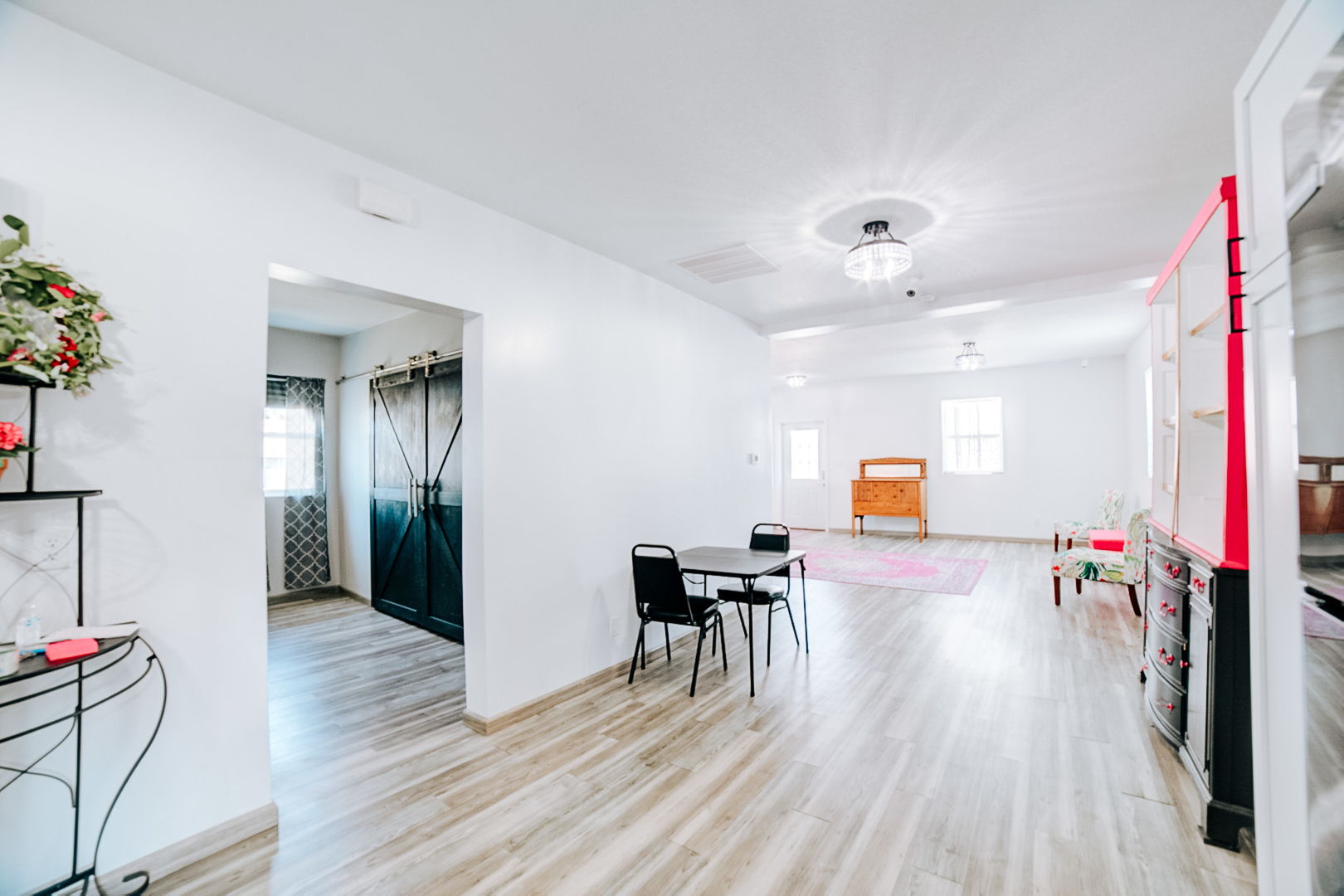 100 East Lyle Street Milford, IL 60953 - Photo 17 of 37 a view of a livingroom with furniture wooden floor and a chandelier