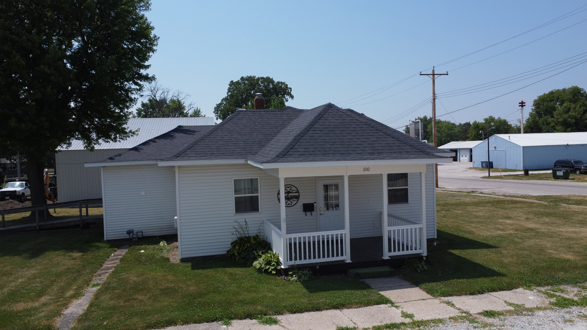 100 East Lyle Street Milford, IL 60953 - Photo 2 of 37 a view of a house with a yard