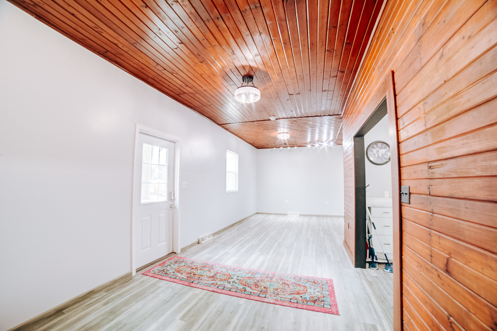 100 East Lyle Street Milford, IL 60953 - Photo 30 of 37 a view of empty room with window and wooden floor