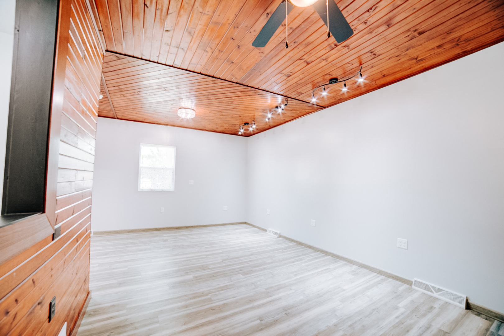 100 East Lyle Street Milford, IL 60953 - Photo 35 of 37 a view of a room with wooden floor and brick walls