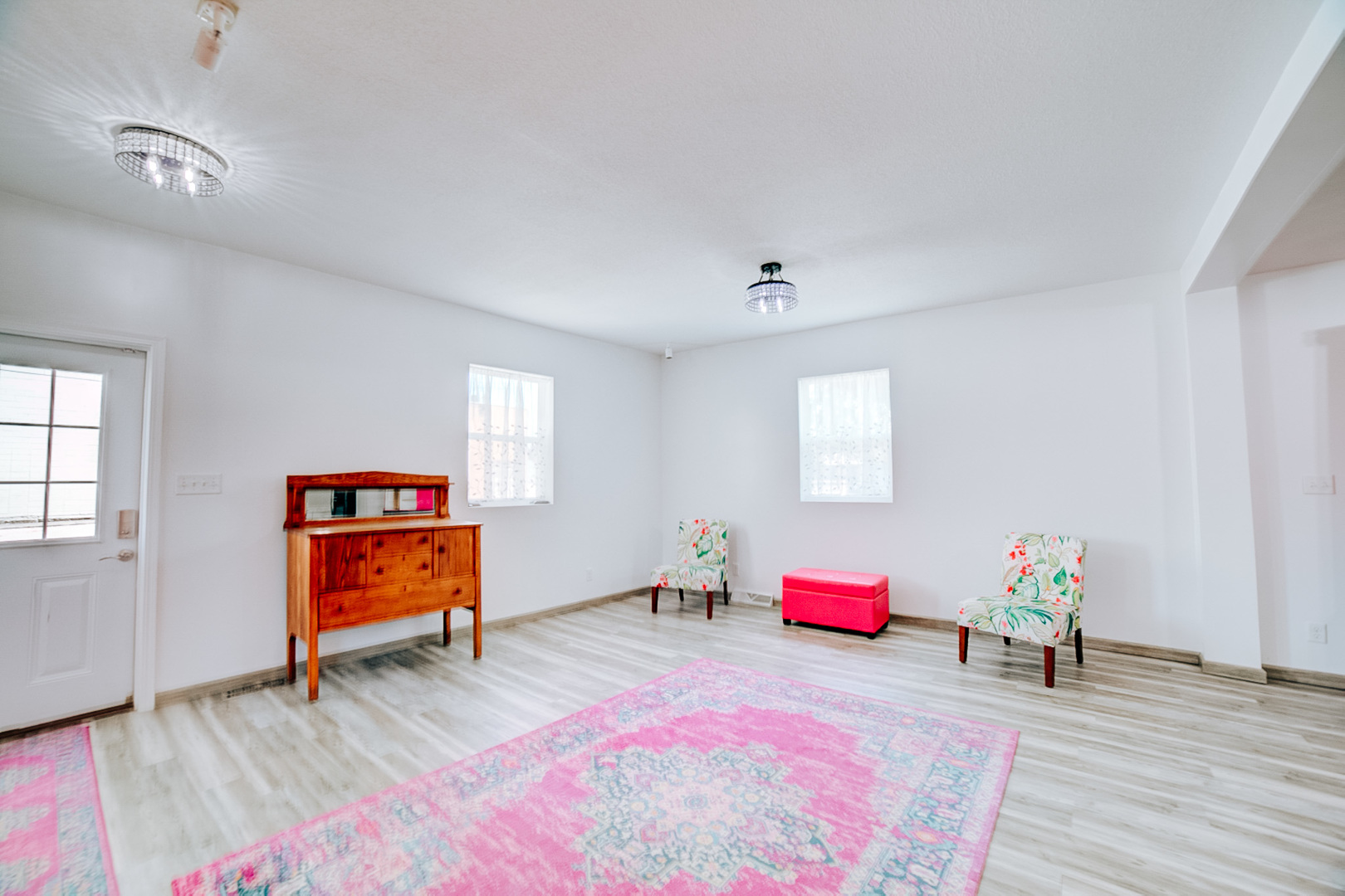 100 East Lyle Street Milford, IL 60953 - Photo 8 of 37 a bedroom with furniture and a wooden floor
