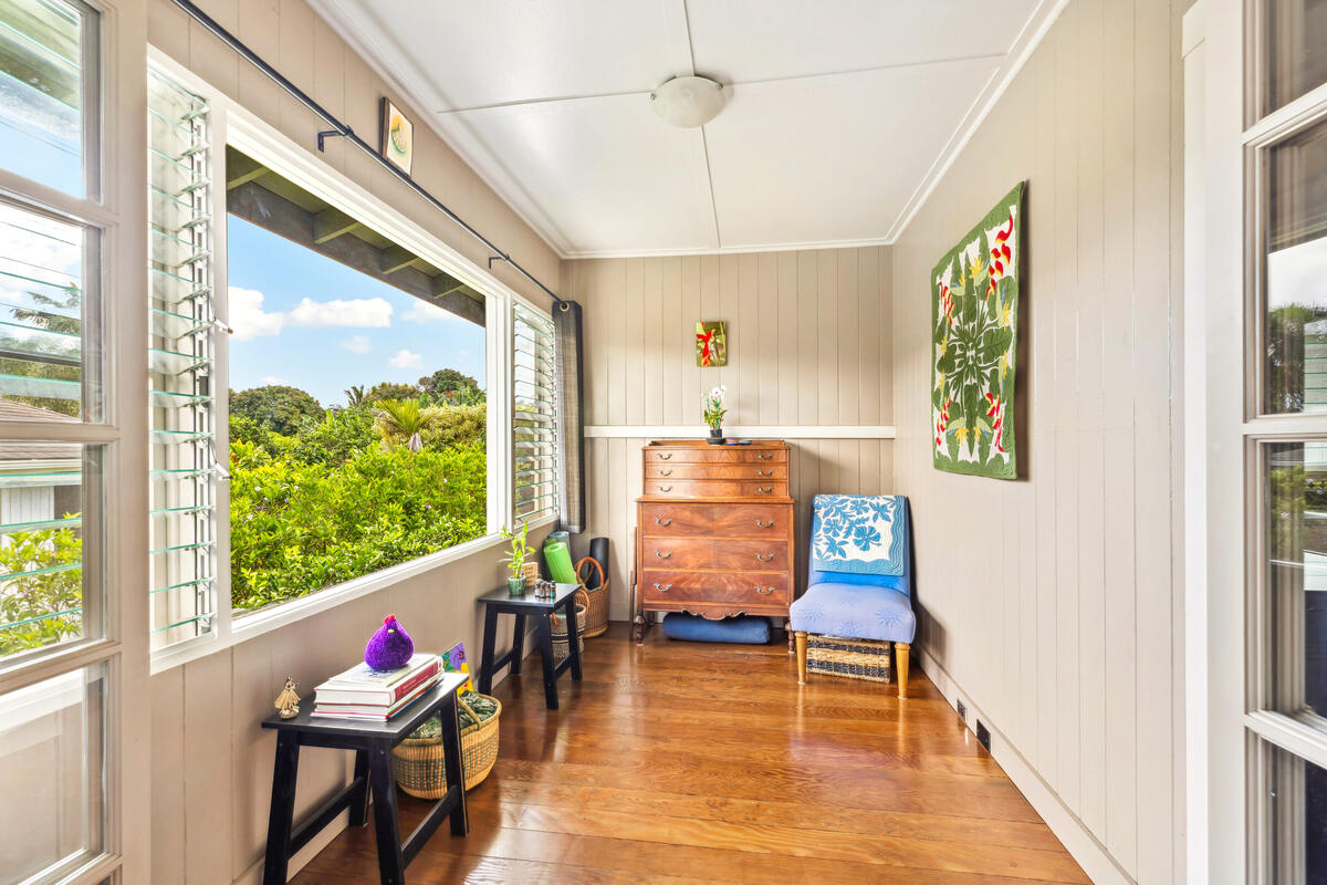 3895 Koloa Road, Unit 1 Koloa, HI 96756 - Photo 12 of 30 a living room with furniture and a large window
