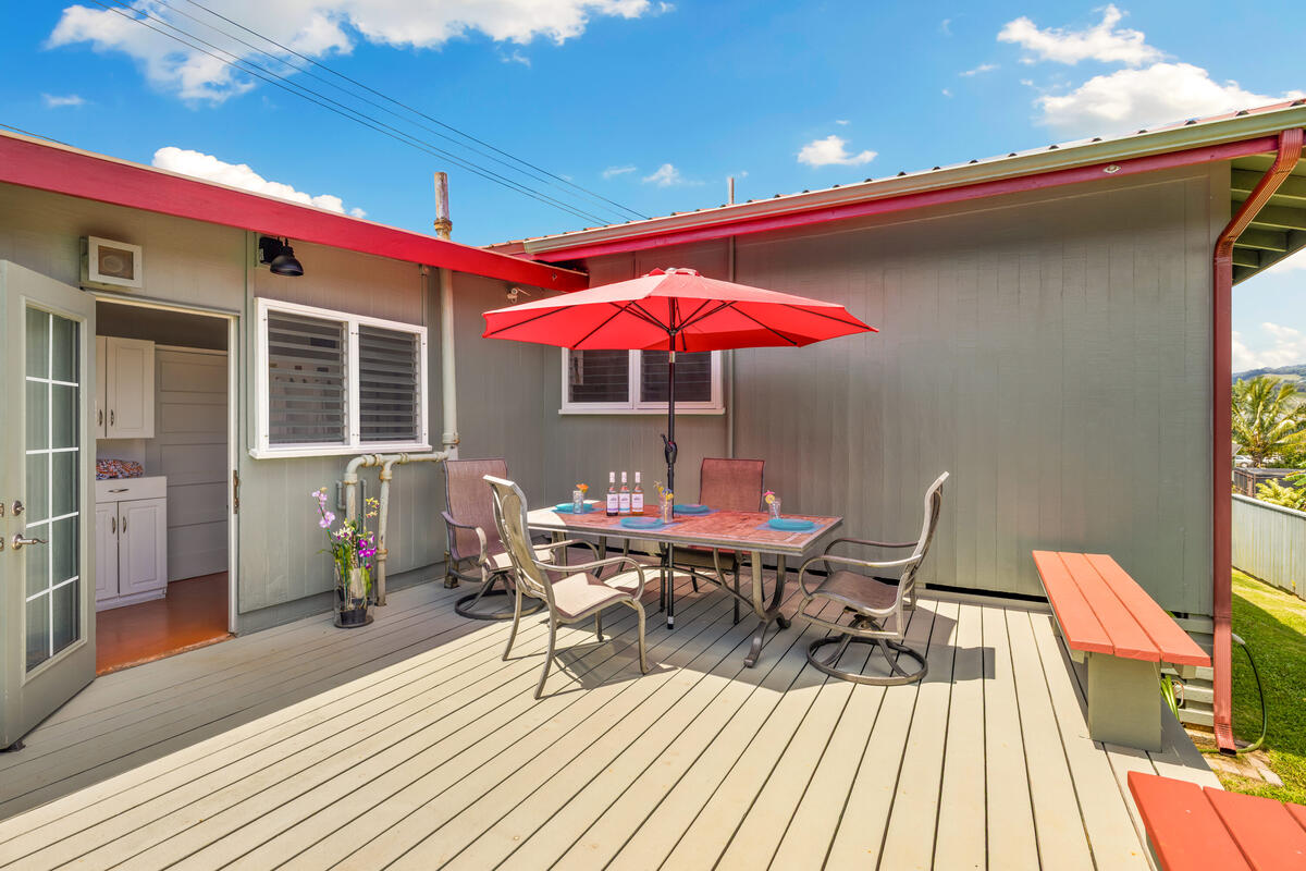 3895 Koloa Road, Unit 1 Koloa, HI 96756 - Photo 26 of 30 a view of a chairs and table on the deck