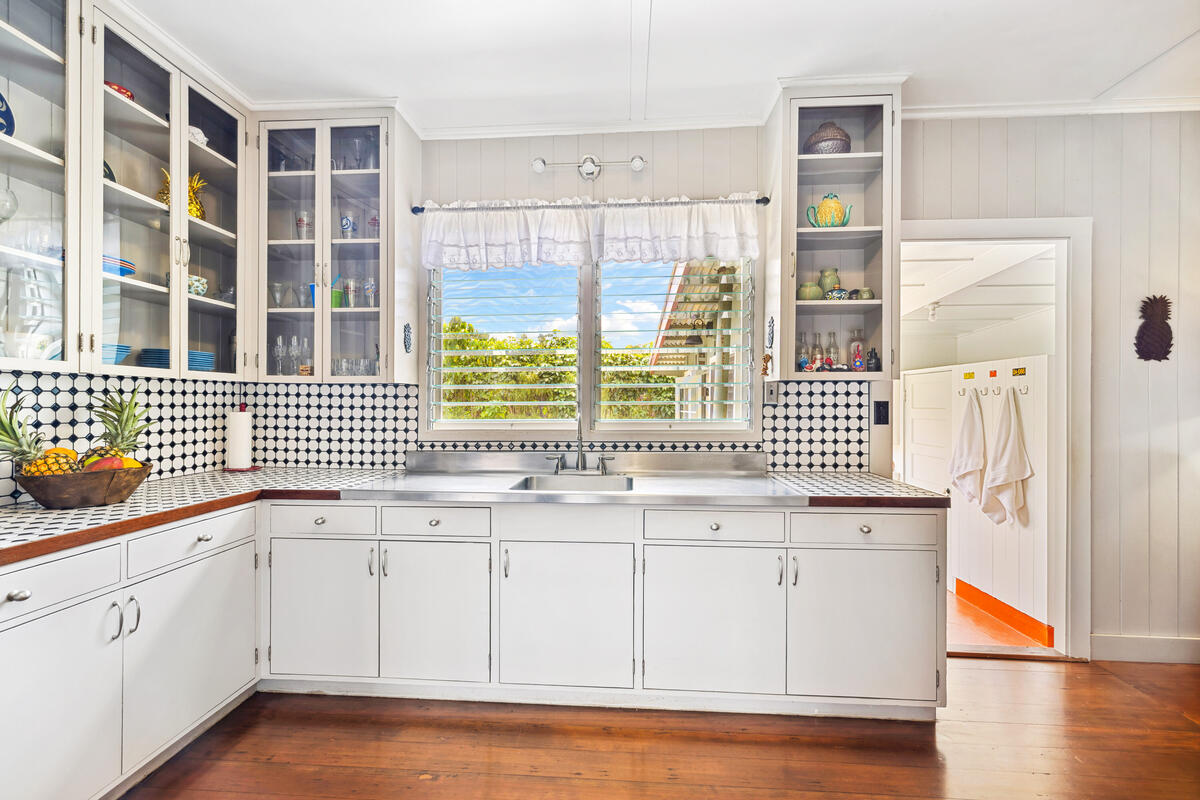 3895 Koloa Road, Unit 1 Koloa, HI 96756 - Photo 5 of 30 a kitchen with a sink a cabinets and window