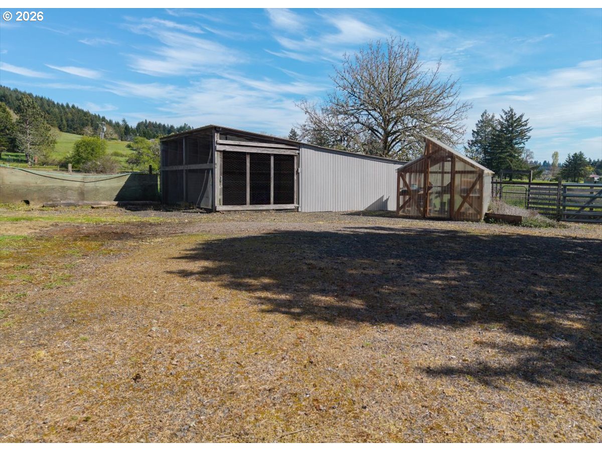 2035 Primrose Loop Philomath, OR 97370 - Photo 23 of 48 a front view of a house with a yard