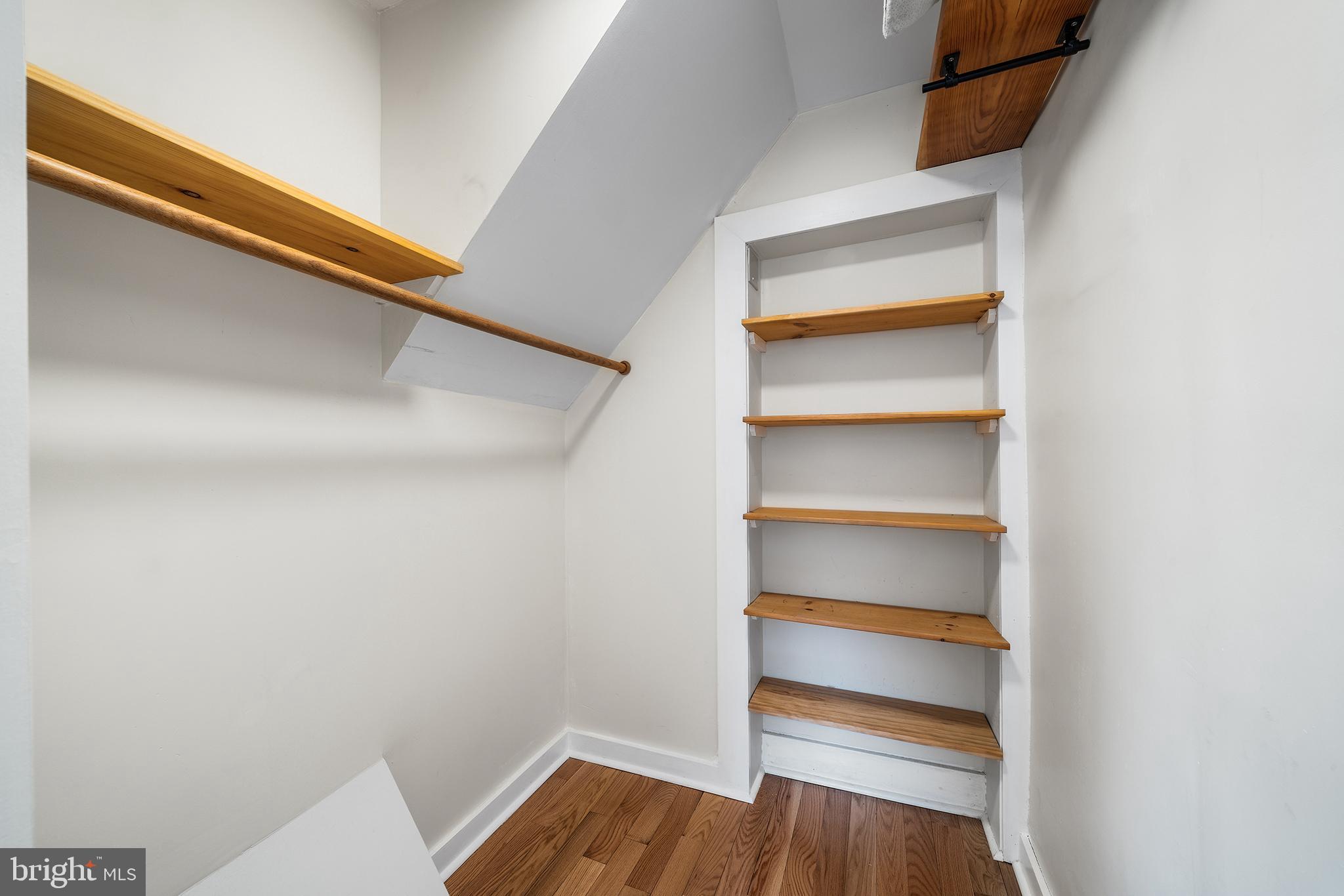 2415 East Firth Street Philadelphia, PA 19125 - Photo 17 of 29 a view of walk in closet with empty racks