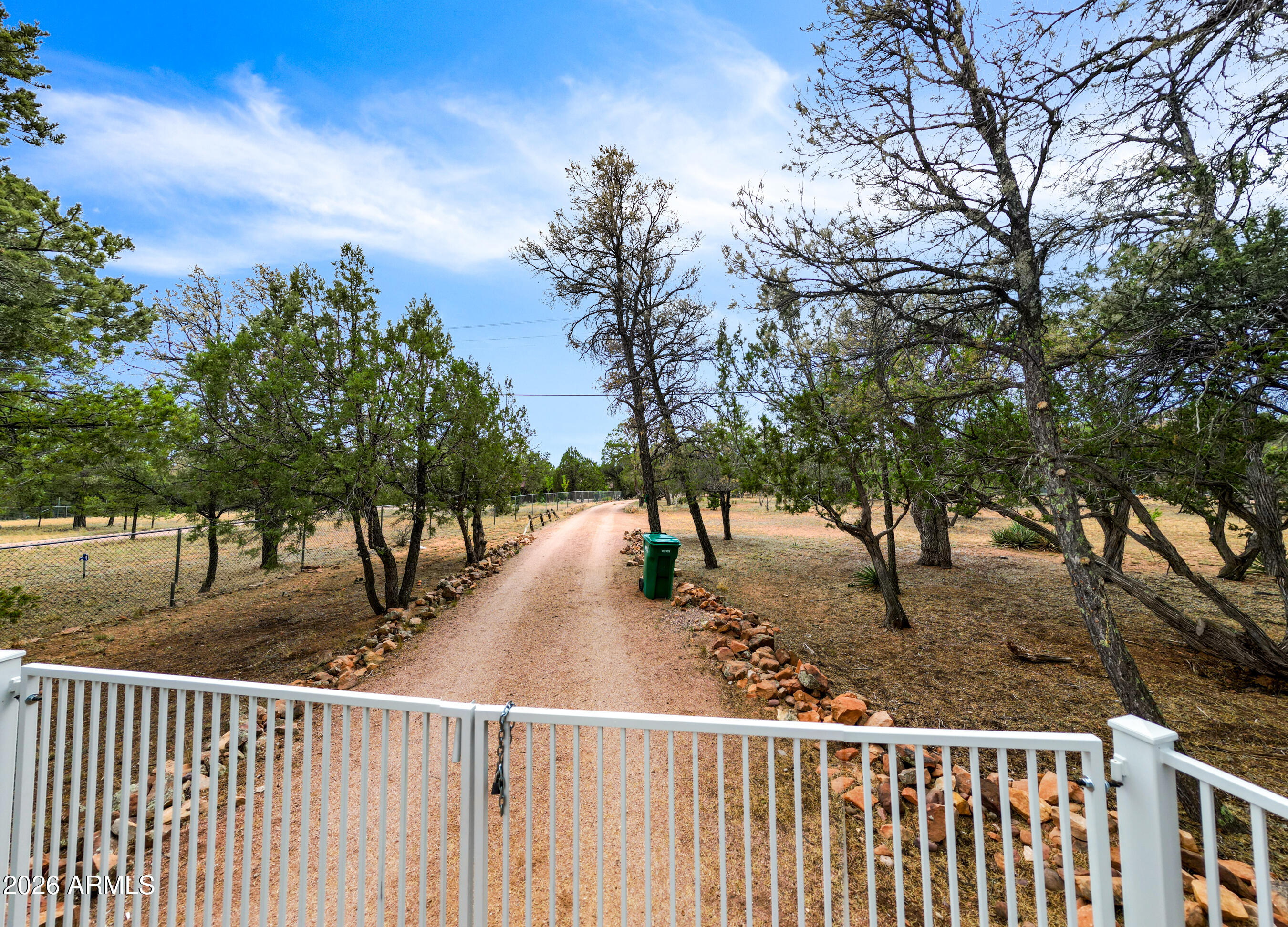 3071 Ponderosa Road Overgaard, AZ 85933 - Photo 5 of 72 2.35 acre Lot is fully fenced.