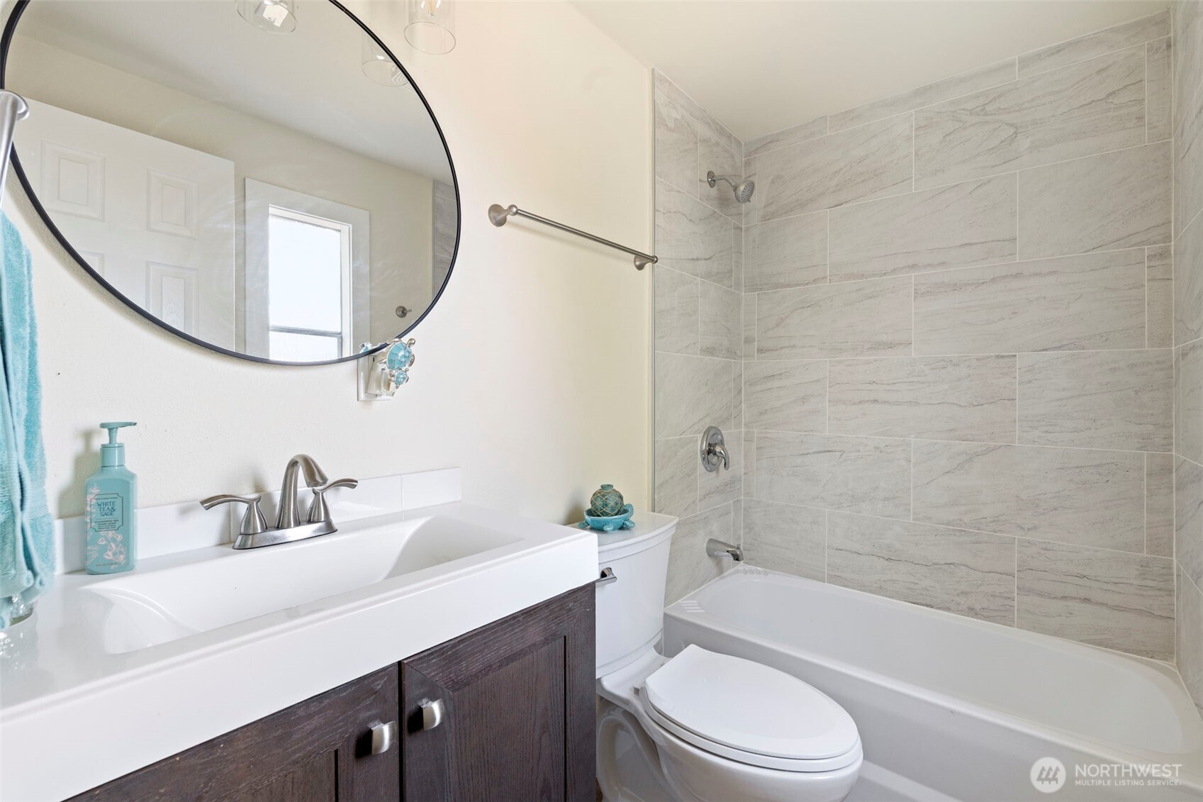 254 Ho Hum Lane Aberdeen, WA 98520 - Photo 11 of 27 a bathroom with a sink a toilet and a mirror
