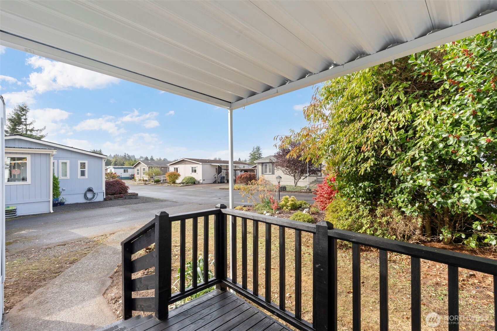 254 Ho Hum Lane Aberdeen, WA 98520 - Photo 19 of 27 a view of a balcony with car parked