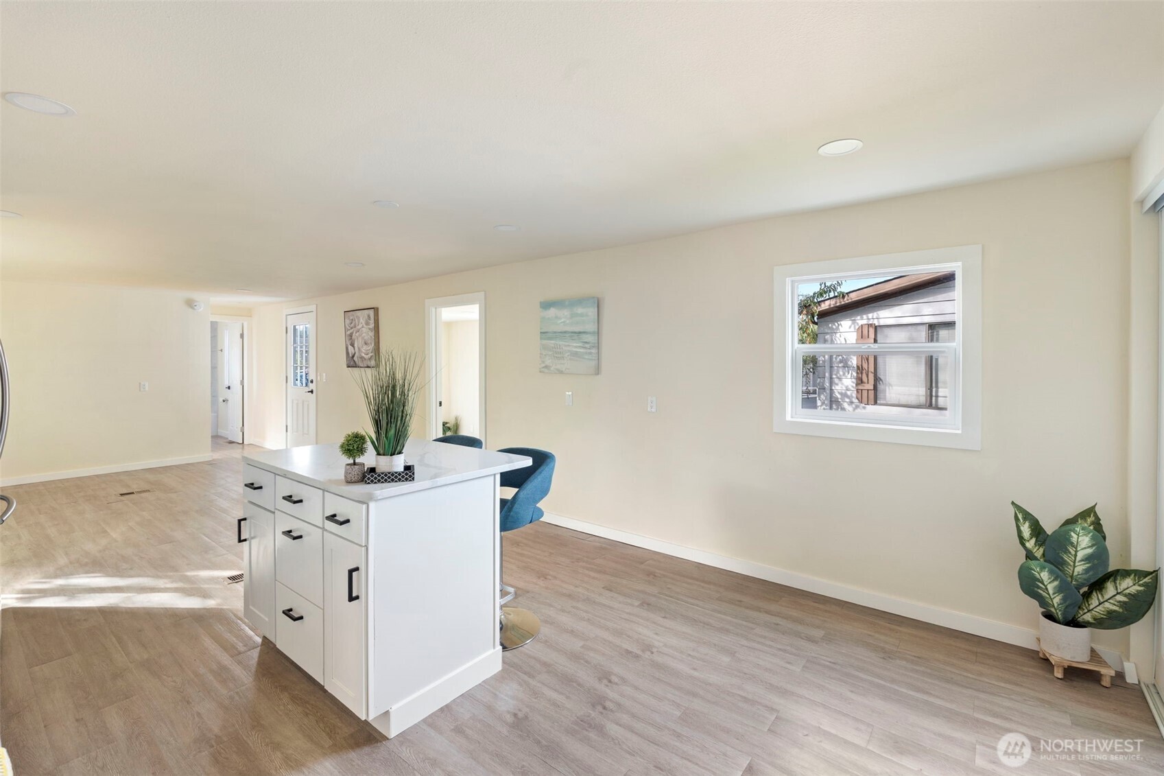 254 Ho Hum Lane Aberdeen, WA 98520 - Photo 8 of 27 a view of cabinets with wooden floor and windows