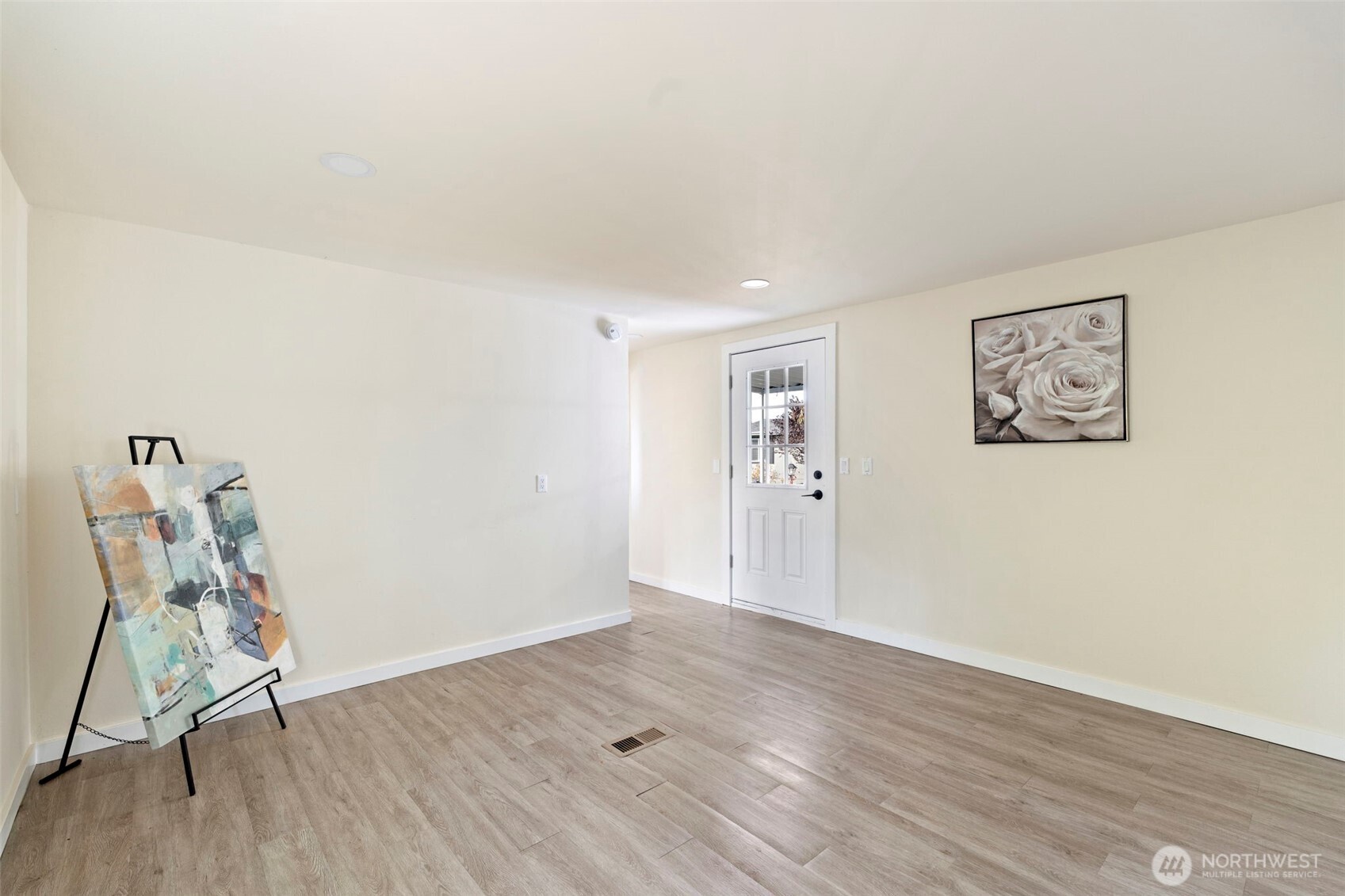254 Ho Hum Lane Aberdeen, WA 98520 - Photo 10 of 27 a view of an empty room with wooden floor