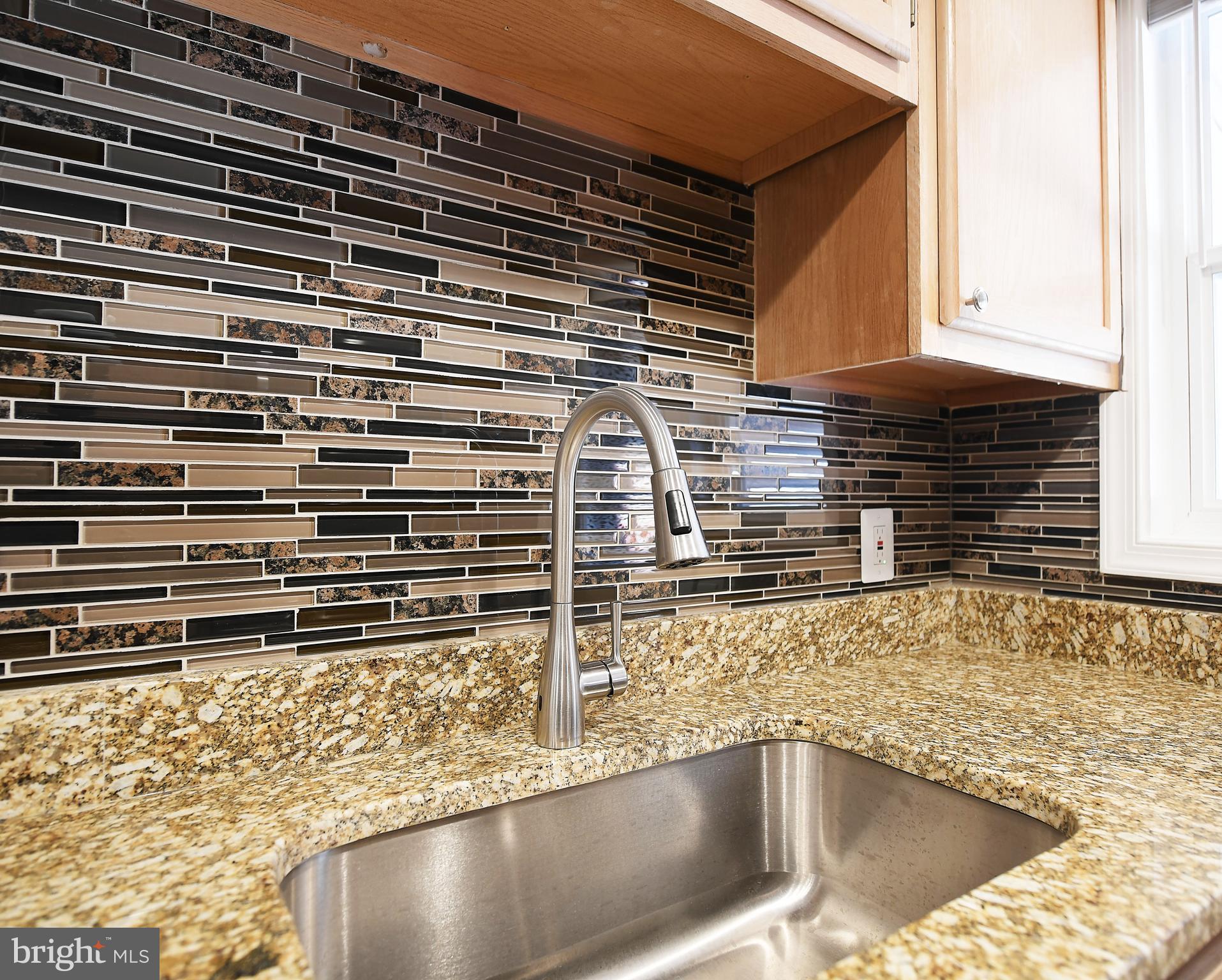 1038 Middleborough Road Baltimore, MD 21221 - Photo 17 of 39 Granite Counter Tops & Tile Back Splash