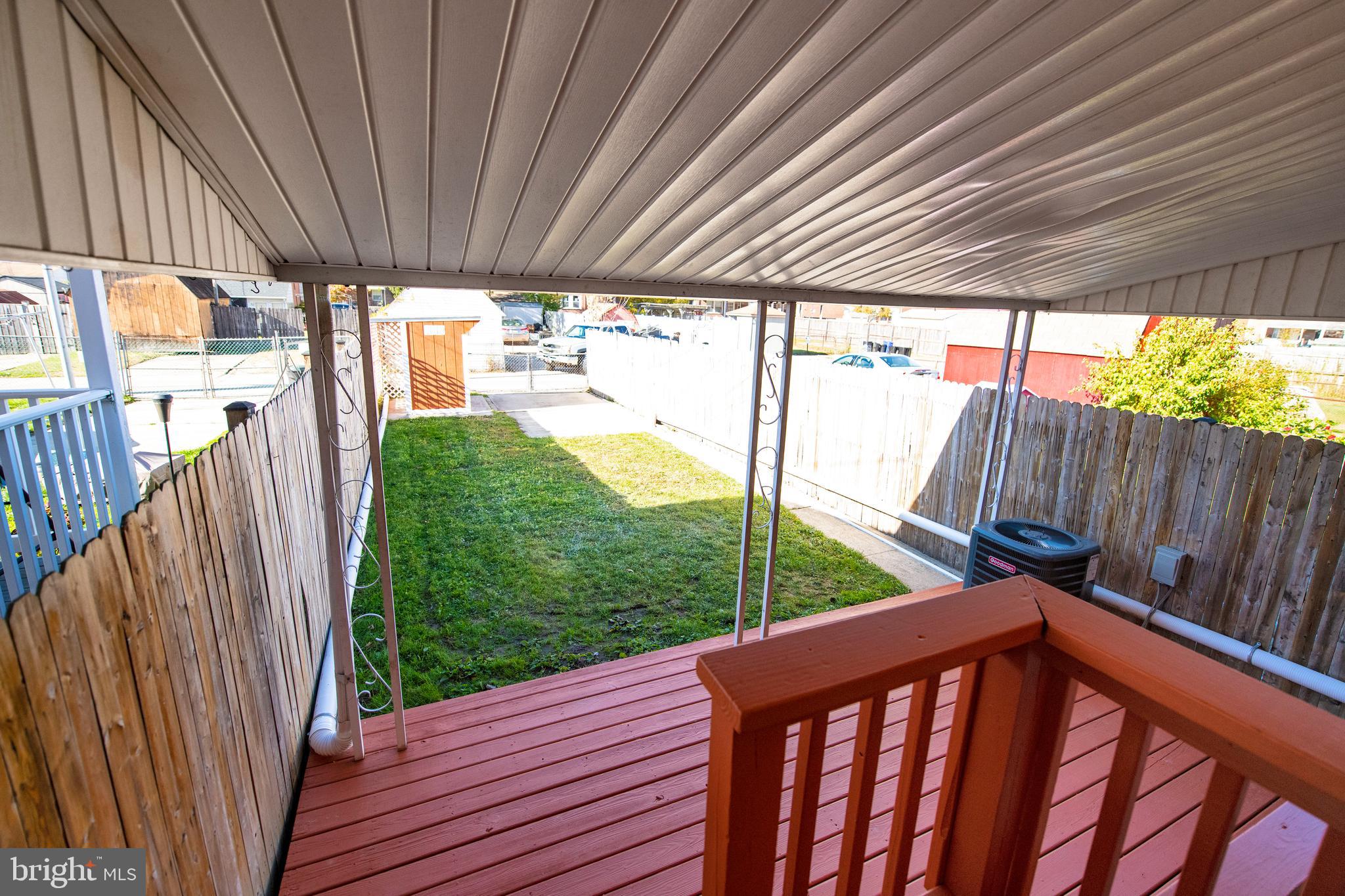 1038 Middleborough Road Baltimore, MD 21221 - Photo 35 of 39 Rear Deck/Patio & Back yard with Parking Pad