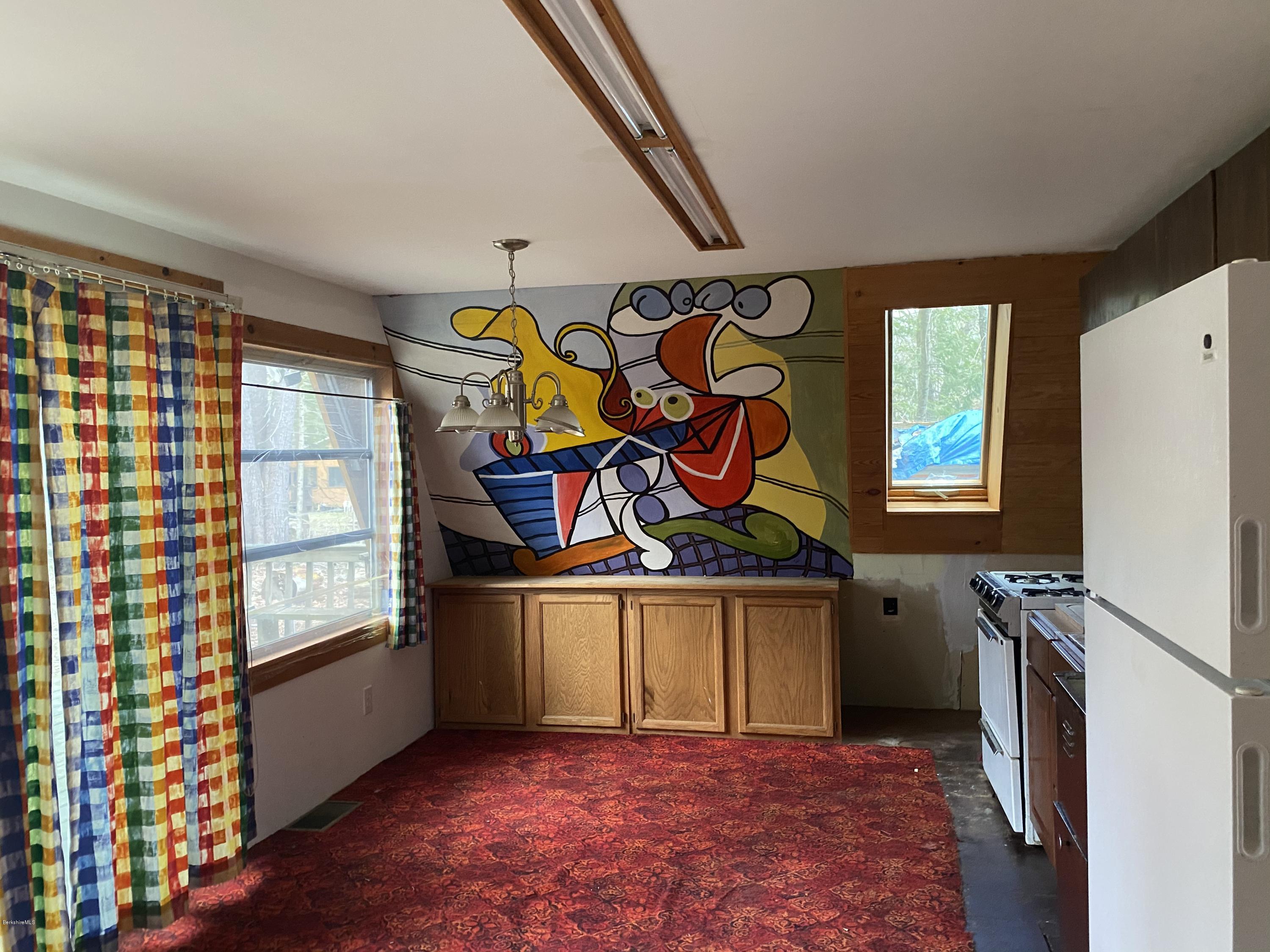 107 Peterson Road Becket, MA 01223 - Photo 10 of 34 a view of an entryway with wooden floor