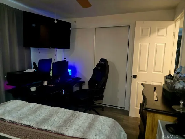 a kitchen with granite countertop a sink stove and cabinets