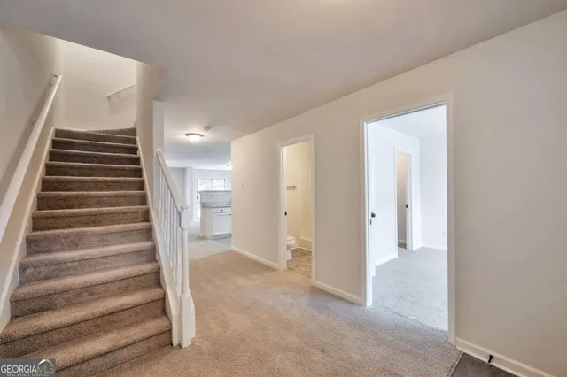 a view of an entryway with staircase