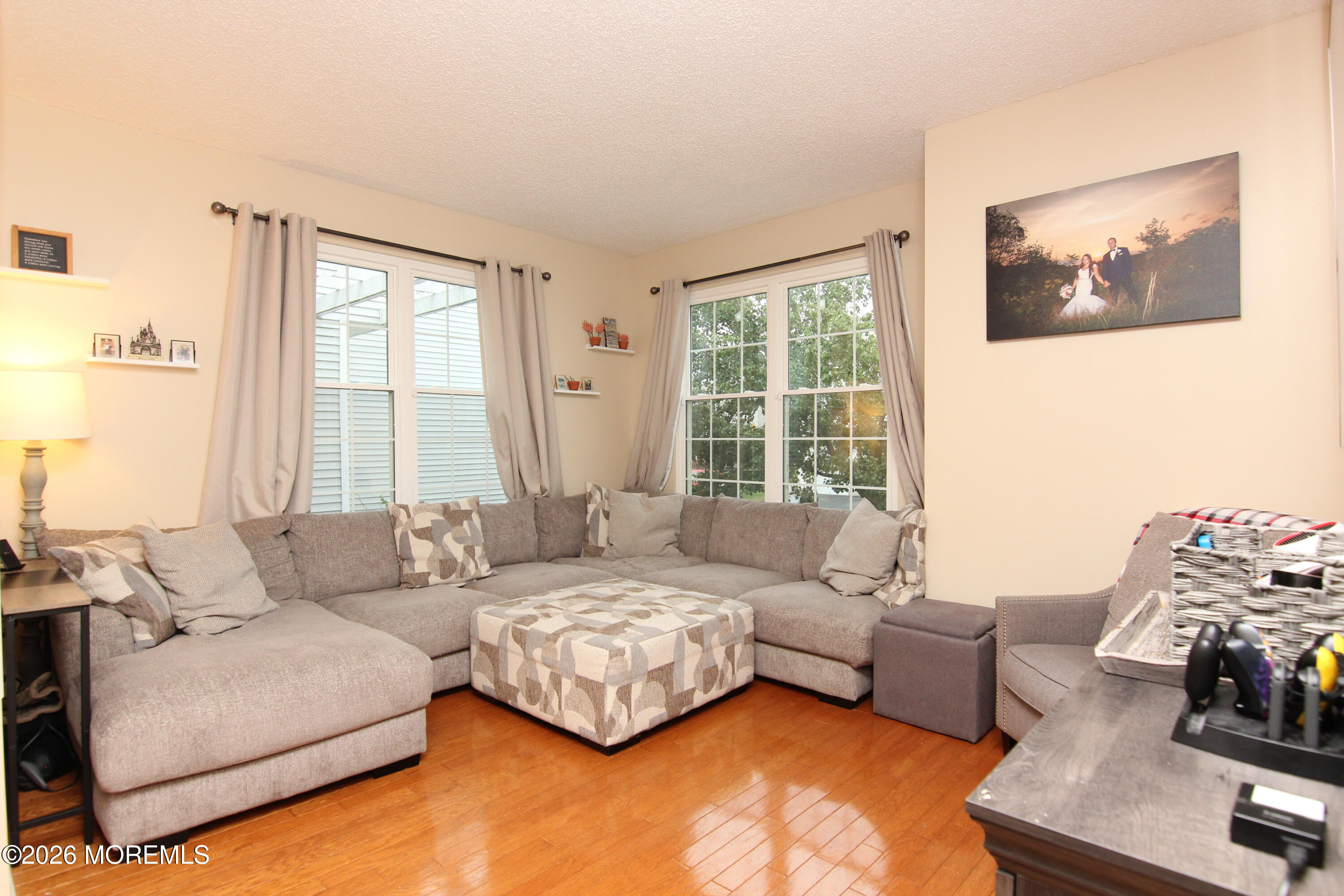 33 Austin Street Tinton Falls, NJ 07712 - Photo 8 of 46 a living room with furniture and a large window