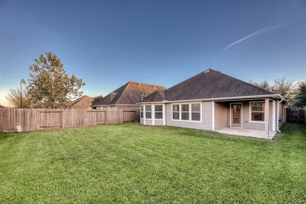 a house view with a garden space